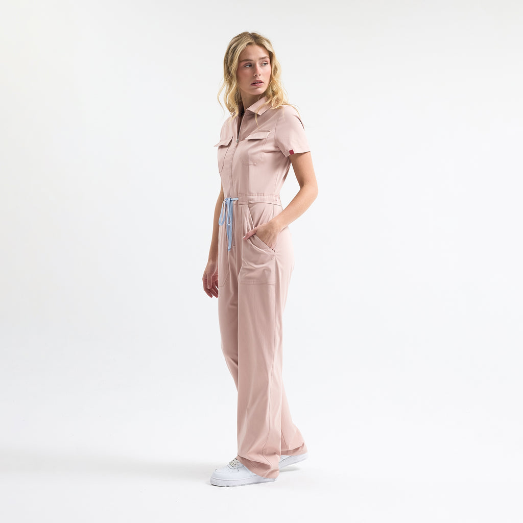 Serene Rose scrubs tulum rose pink, side view with drawstring waist and cargo pockets