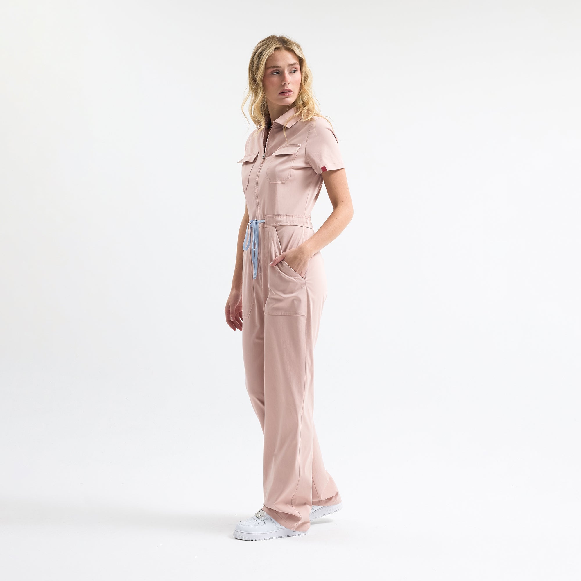 Serene Rose scrubs tulum rose pink, side view with drawstring waist and cargo pockets