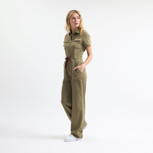 Hunter green scrub tulum, short sleeves, front zip, tie waist, utility pockets
