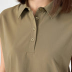 Close-up of olive polo neckline and button placket