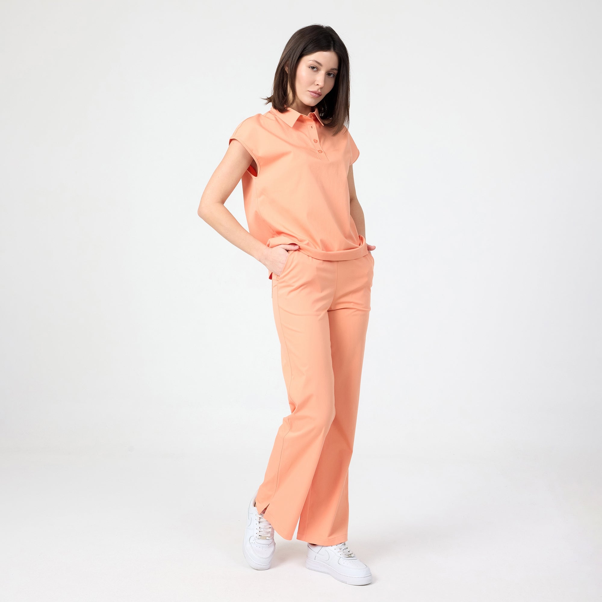 Tangerine scrub pants with elastic waistband and straight wide legs