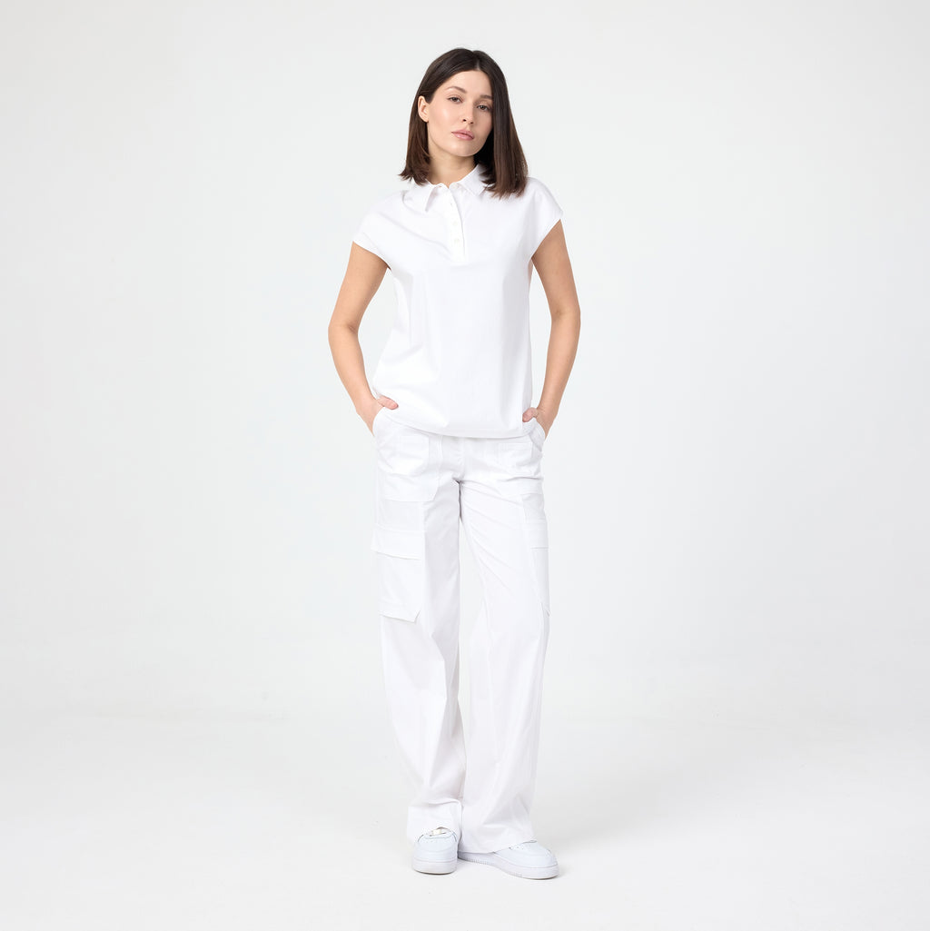 White polo T-shirt on model, short sleeves, button placket and collar