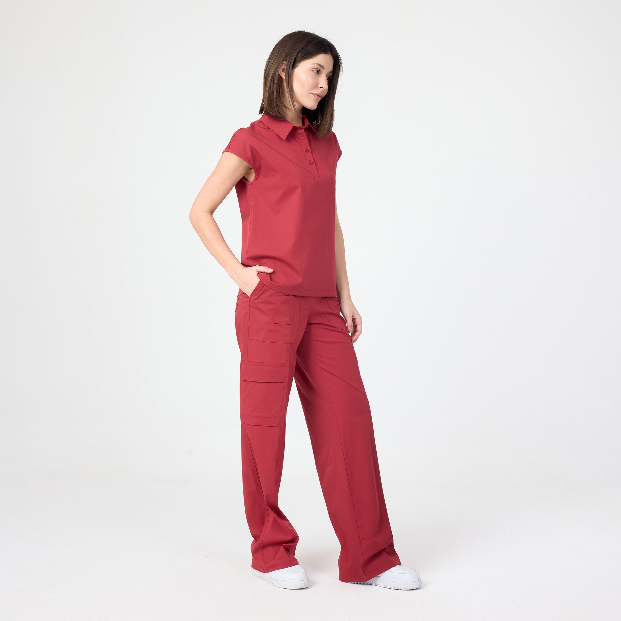 Chili red polo T-shirt with collar and short sleeves, button placket; side view