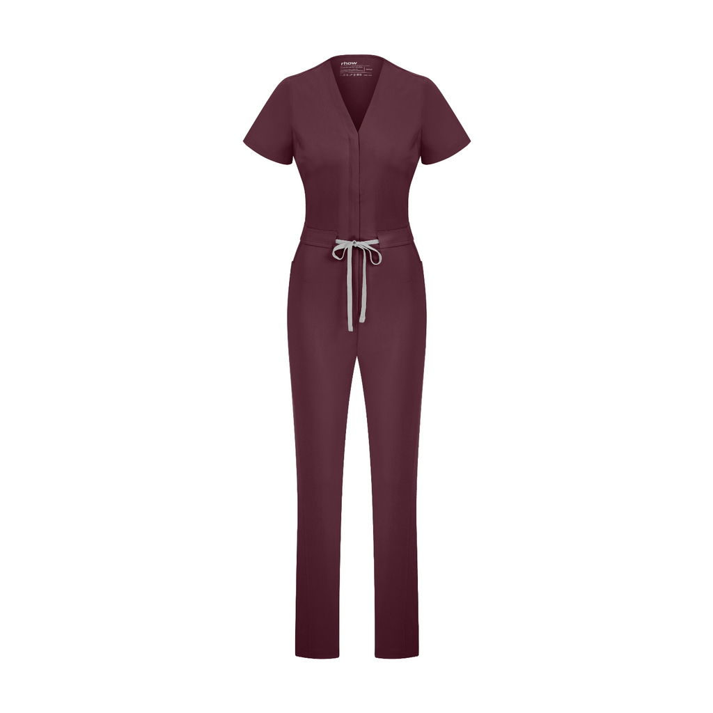 Rhow Shop Sunray Slim Scrubs Chicory tulum; V yaka, bel bağcıklı, ön fermuarlı.