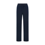 Navy scrub pantolon; belde ip bağcık ve ön/arka düz hatlar.