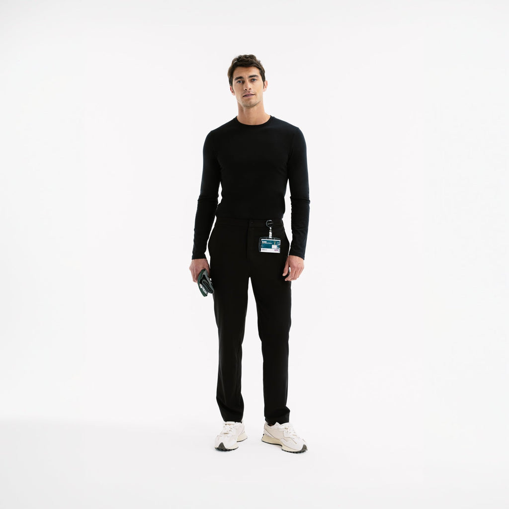 Siyah slim scrub pantolon, uzun paça ve düğmeli bel kapama