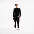 Siyah slim scrub pantolon, uzun paça ve düğmeli bel kapama