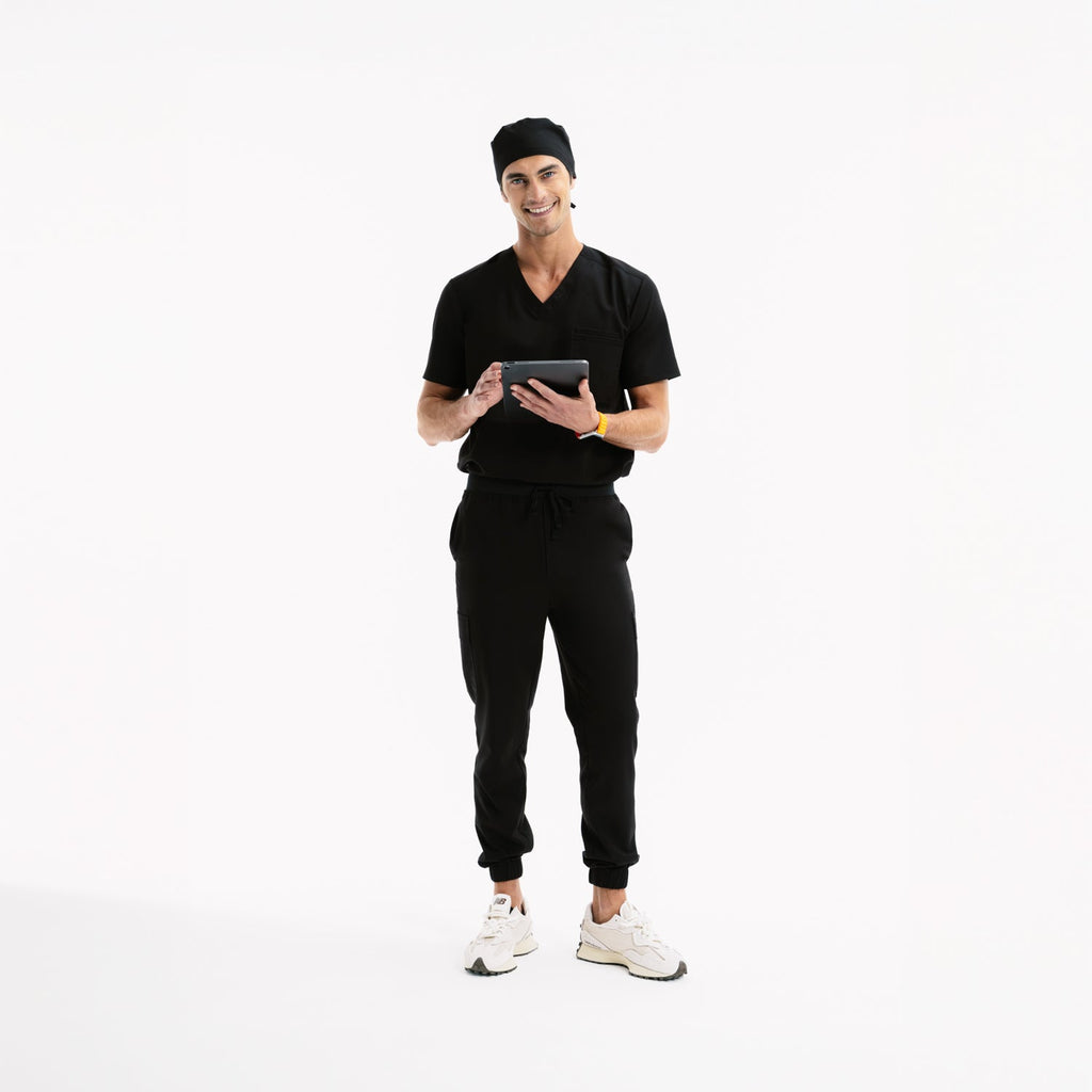 Siyah jogger scrub pantolon, bağcıklı lastikli bel, bilek lastikleri