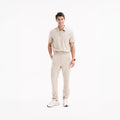 Arrow Marl scrub pantolon; açık bej, kargo cepli ve bel detaylı