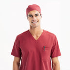 Chili scrub top with front pocket and matching scrub cap
