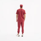 Chili scrub set with top, cargo-style pants, and white sneakers