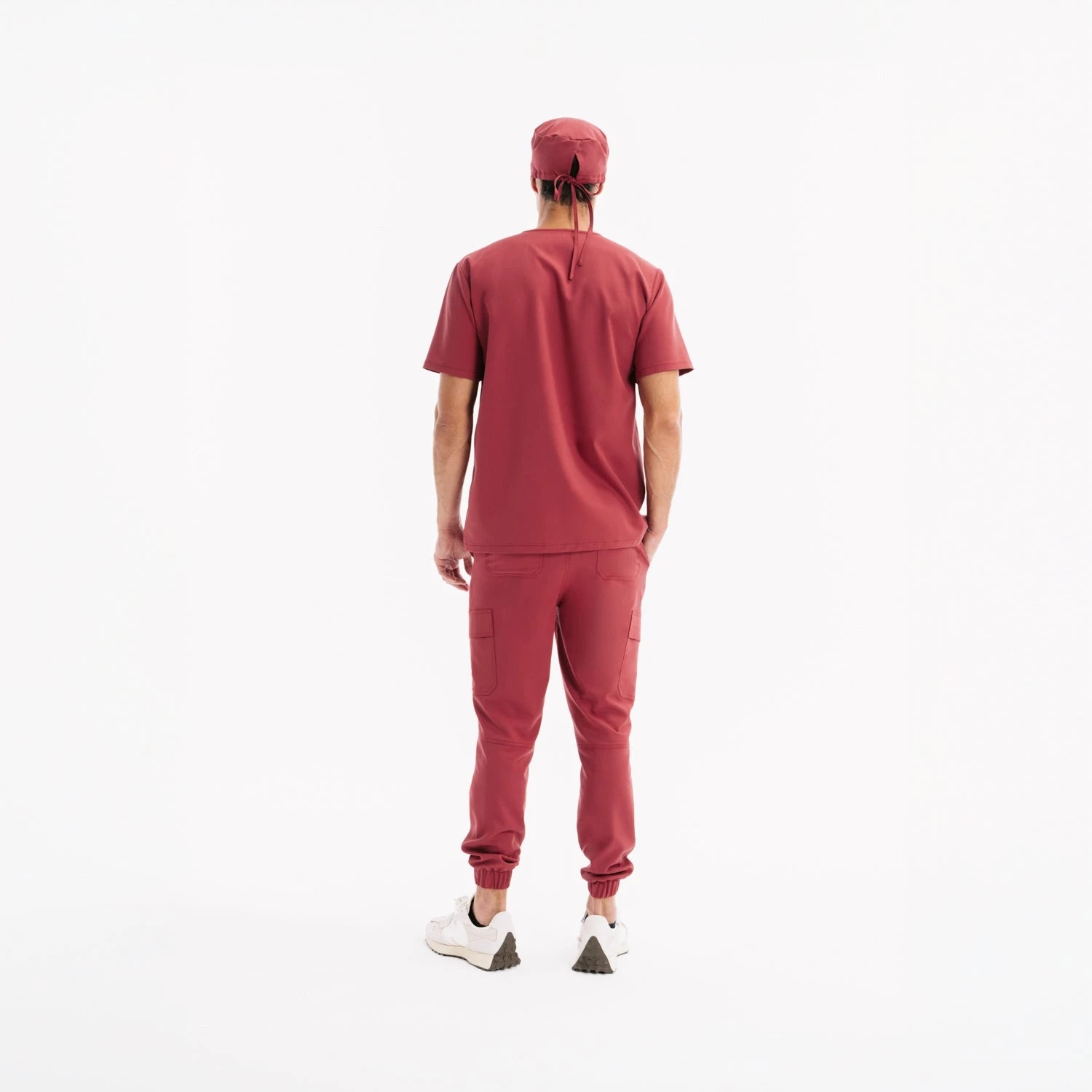 Chili scrub set with top, cargo-style pants, and white sneakers
