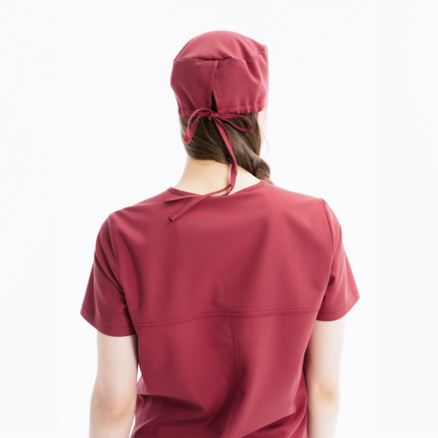 Maroon scrub top, back view with center seam and short sleeves