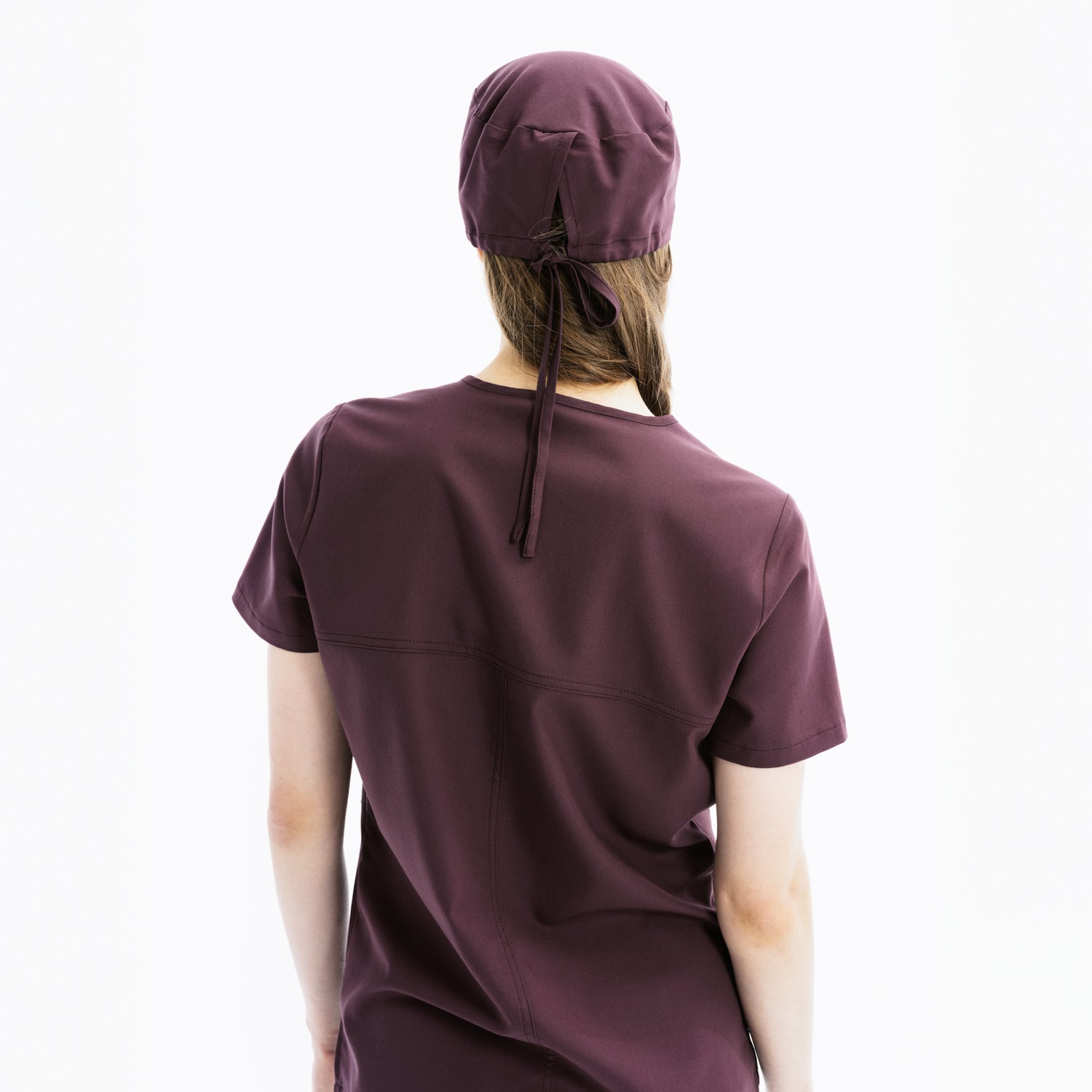 Chicory scrub üst arkadan görünüm, bağcıklı yaka ve cep detaylı, kısa kollu